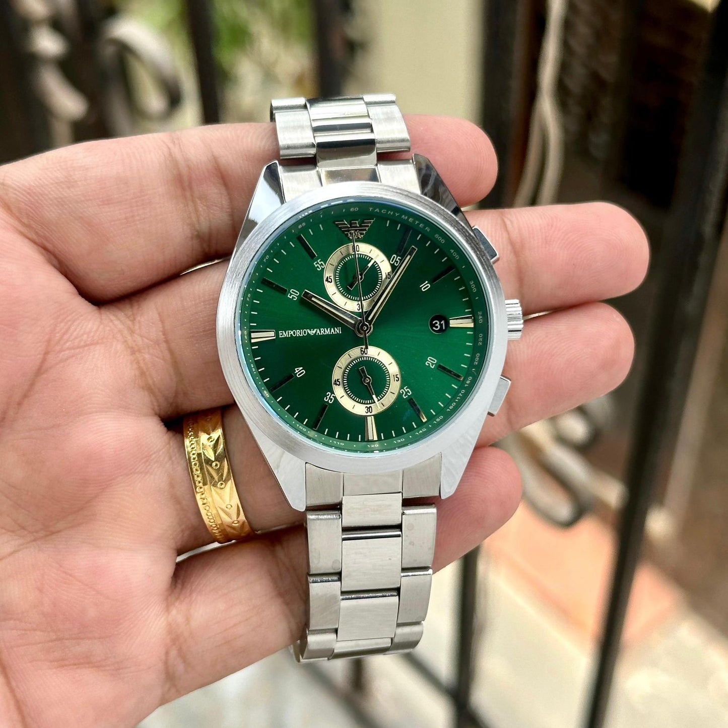 Emporia Armani(Green and silver) watch